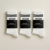 Celvian white crew socks 9-Pair Set with black logo and stripe detail, labeled packaging reading “Stay active. Stay inspired. Stay Celvian.” studio shot.
