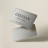 Celvian Gift Card in brushed metallic silver design featuring engraved logo and website text, minimalist floating studio shot.