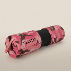 Celvian pink camo barbell pad with black center support and logo detail on a clean neutral background.
