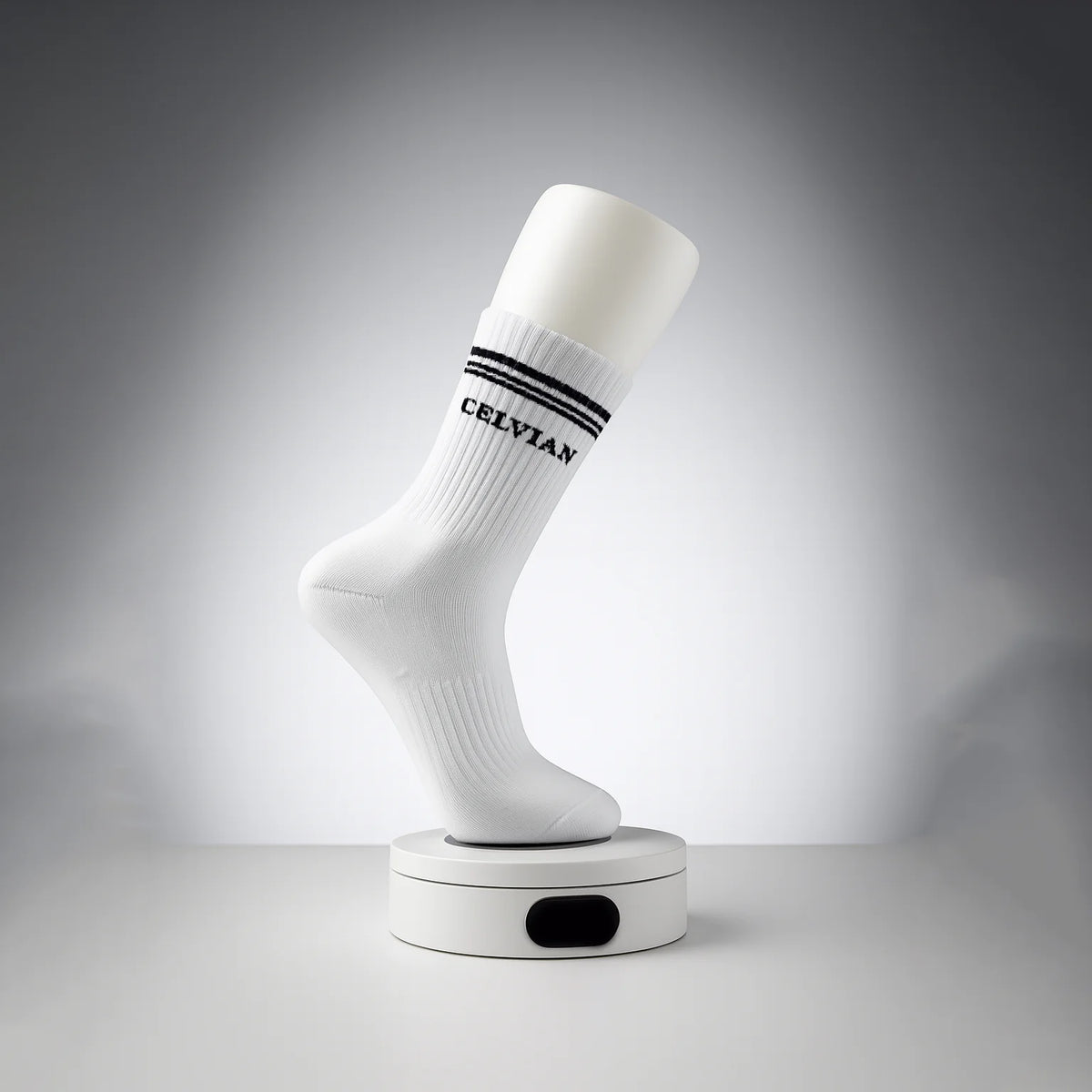 Celvian white crew sock displayed on mannequin foot, featuring black logo and double stripe design, minimalist product photo with soft lighting.