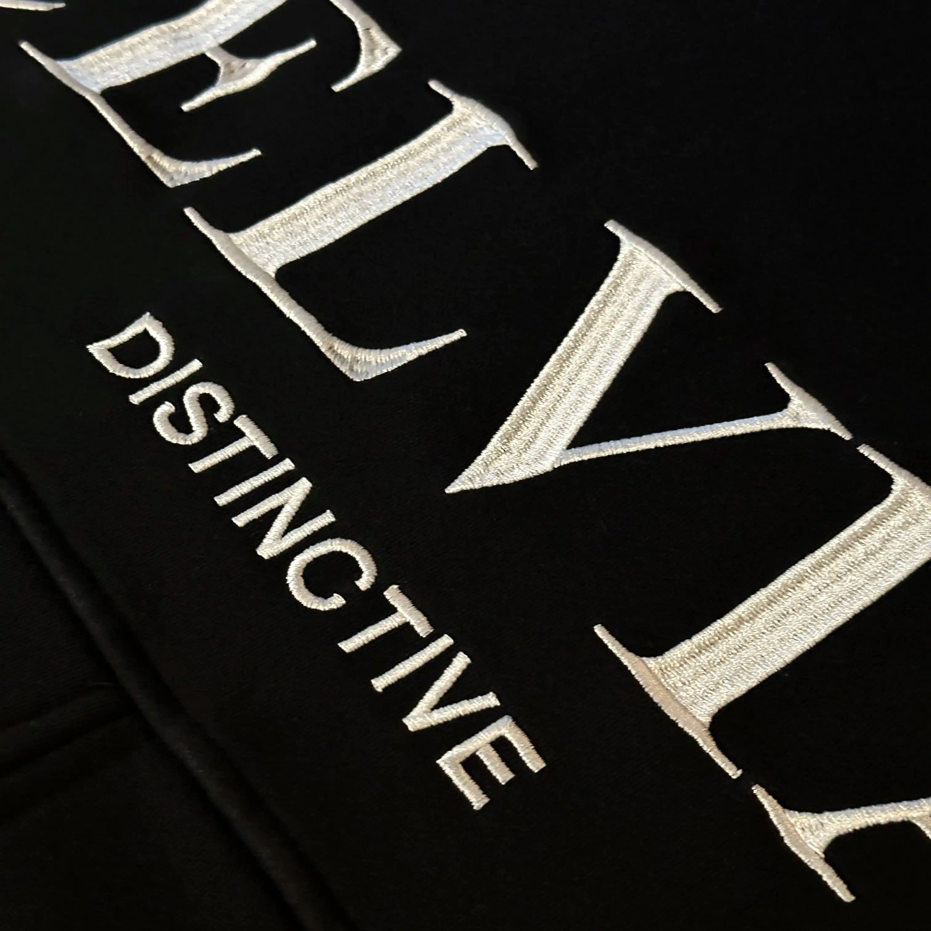 Back view of the Celvian black embroidered hoodie
