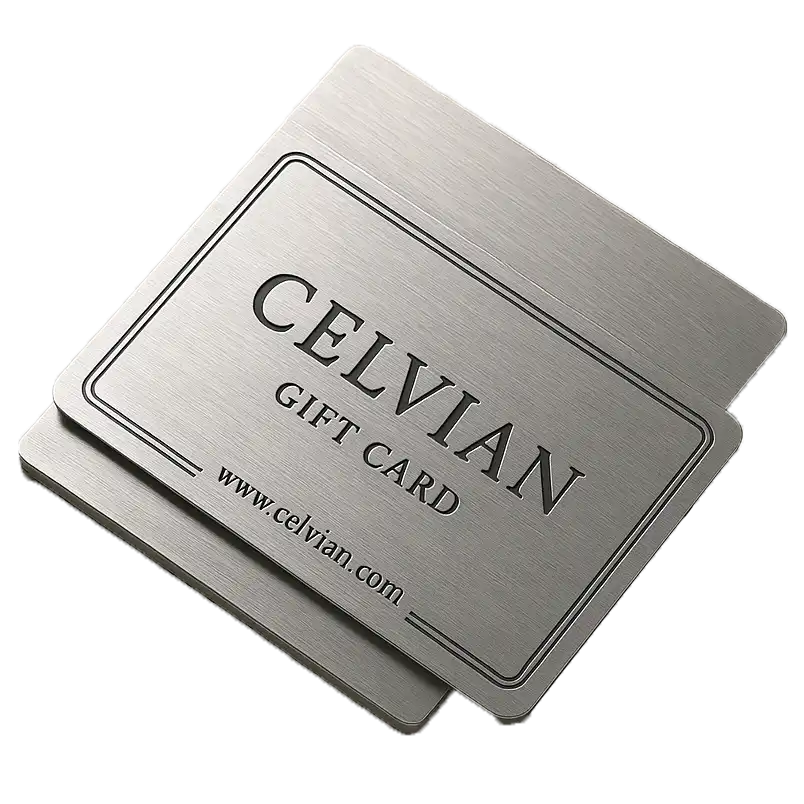 Celvian Gift Card in brushed silver metal design featuring engraved logo and website text, minimalist close-up with clean lighting.