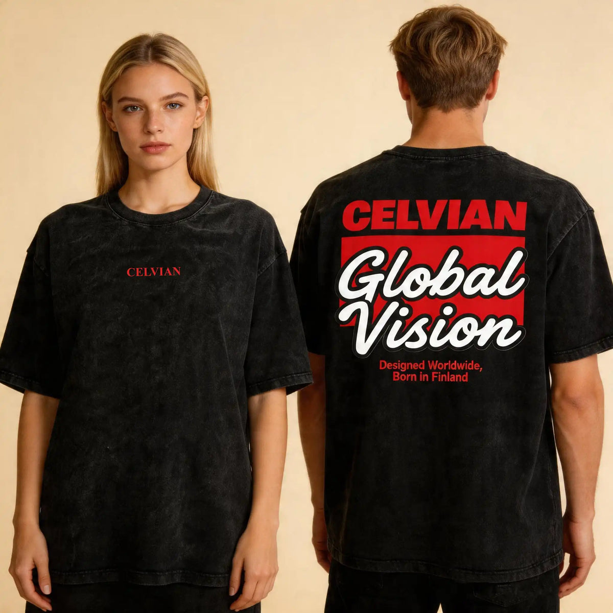 Female and male models wearing the Celvian Obsidian Global Vision T-Shirt in a washed black finish, showing the minimal front chest logo and bold back graphic in a clean studio shot.